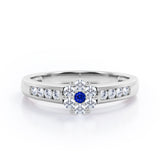 Clustered 1 carat Round Petite Blue Sapphire and Moissanites Channel Engagement Ring in White Gold