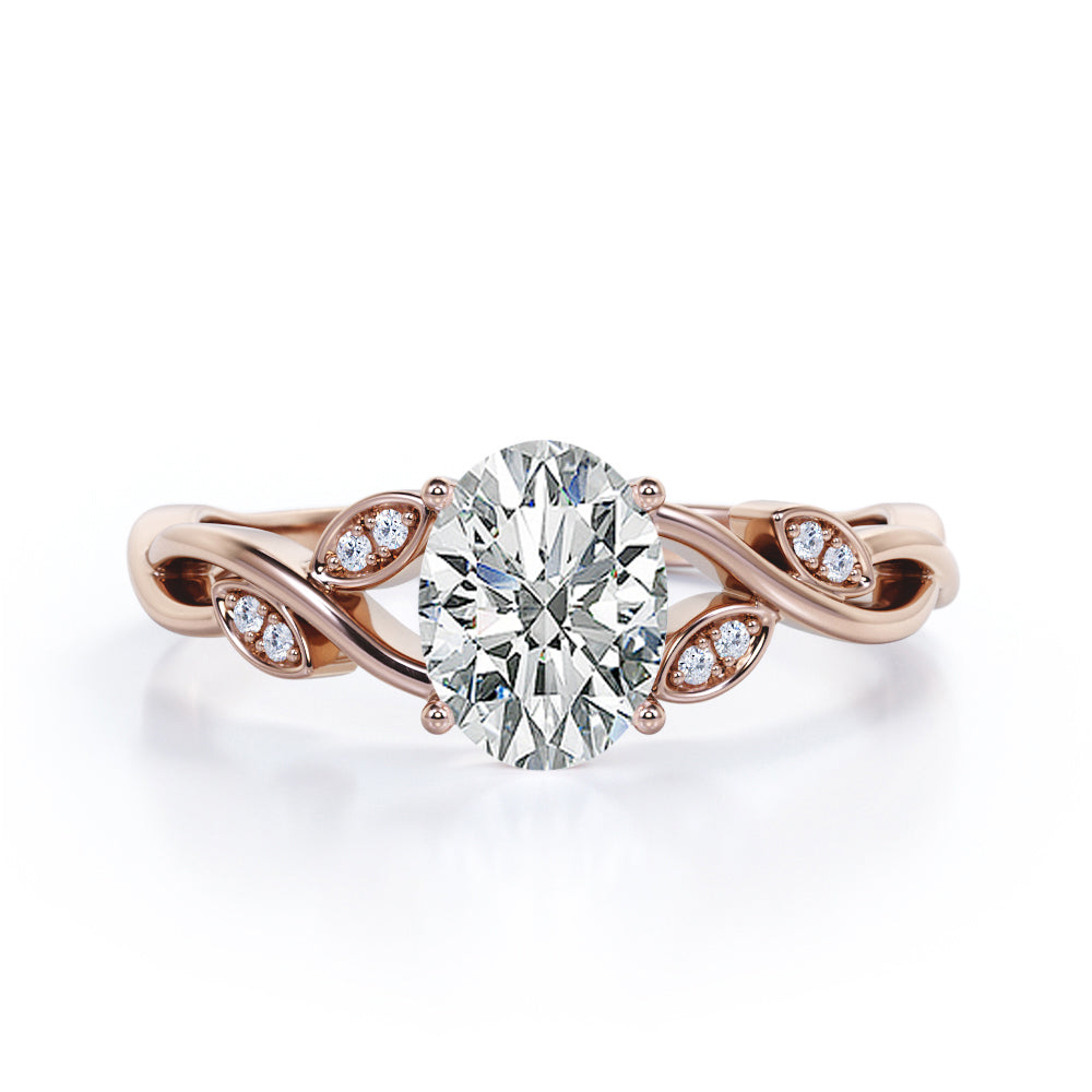 Modern Infinity Twisted 1 carat Oval Moissanite and diamond Engagement Ring in Rose Gold