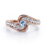 Spinning 0.7 carat Round Aquamarine and Moissanite Channel Engagement Ring in White Gold