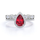 Eternity Pave Set 2 Carat Pear Cut Lab Ruby and Diamond Halo Wedding Ring Set in White Gold