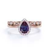 Antique Art Deco 1.50 Carat Pear Cut Lab Alexandrite and Diamond Halo Bridal Set Rings