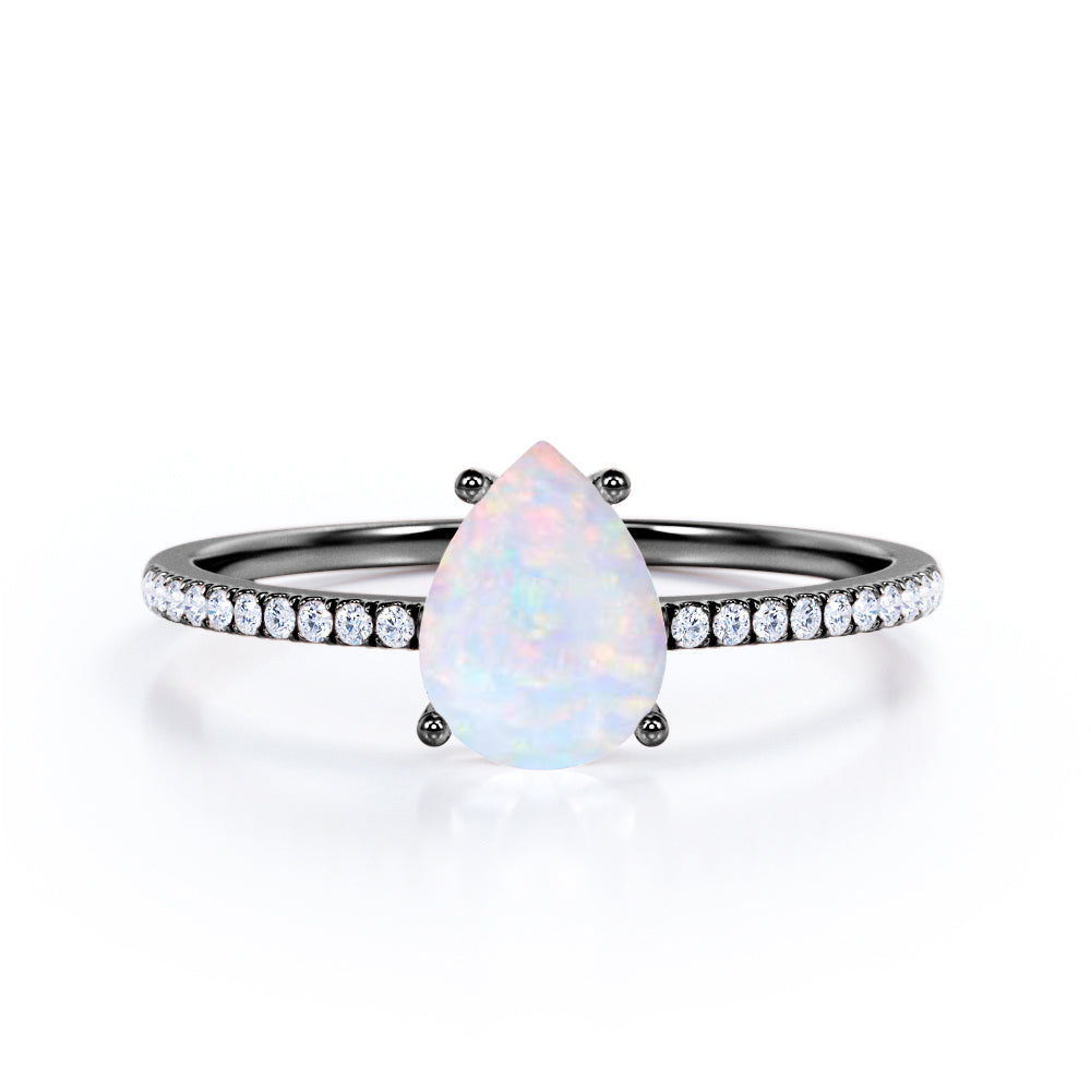 Pave Set 1.30 Carat Pear Cut Light Opal And Diamond Four Prong Basket Set Engagement Ring In Rose Gold