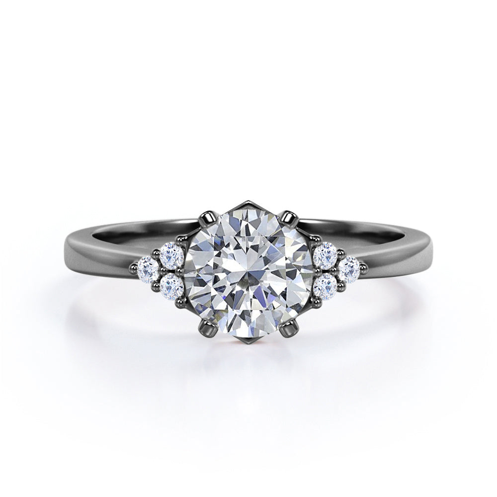 Tapered Classic 0.55 carat Round Moissanite and Diamond Engagement Ring in White Gold