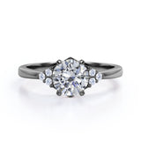 Tapered Classic 0.55 carat Round Moissanite and Diamond Engagement Ring in White Gold