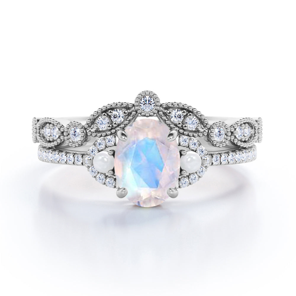 Antique 0.9 carat Oval Moonstone and Moissanite Wedding Ring Set in Black Gold