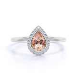 Elegant Pave 1.50 Carat Pear Shape Morganite and Diamond Halo Engagement Ring in White Gold