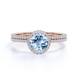 Antique Style 1.75 Carat Round Brilliant Cut Aquamarine and Diamond Halo Bridal Ring set in White Gold