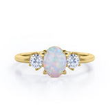 Three Stone 1.1 Ct Oval Cut Lab Created Opal Engagement Ring