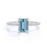 Four Prong 1.25 Carat Emerald Cut Aquamarine and Moissanite Engagement Ring in 18k White Gold over Silver