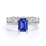 Unique Prong Set 2.25 Carat Emerald Cut Sapphire and Diamond Pave Bridal Set with Eternity Band in White Gold