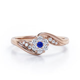 Floral Cloud Clustered 0.55 carat Round Blue Sapphire and Moissanite Distorted Engagement Ring in White Gold