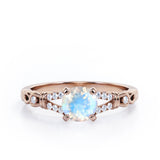 Split Shank 0.6 carat Round Moonstone and Diamond Engagement Ring in Rose Gold