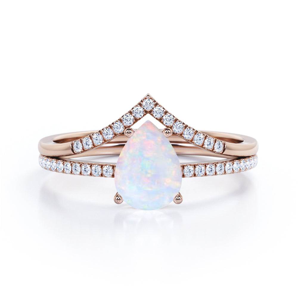 Affordable 1.40 Carat Pear Cut Genuine Opal And Diamond V Style Pave Bridal Set In White Gold.
