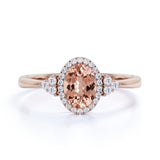 Four Prong 1.15 Carat Oval Cut Morganite and Six Stone Diamond Engagement Ring in Rose Gold