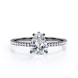 Classic Pave 0.7 carat Pear Moissanite and diamond Engagement Ring in White Gold