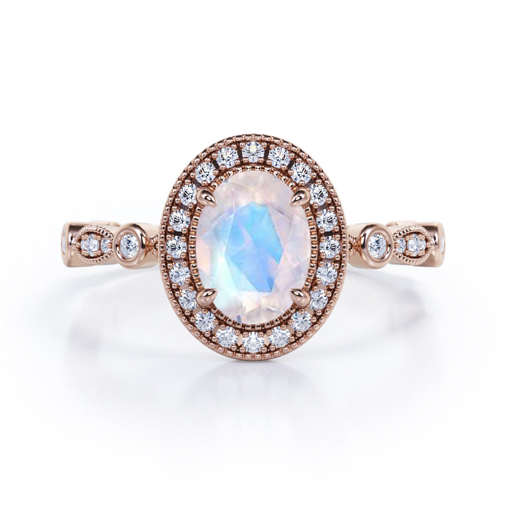 Antique Art Deco 1.35 Carat Oval Cut Moonstone And Diamond Halo Engagement Ring In White Gold