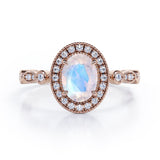 Antique Art Deco 1.35 Carat Oval Cut Moonstone And Diamond Halo Engagement Ring In White Gold