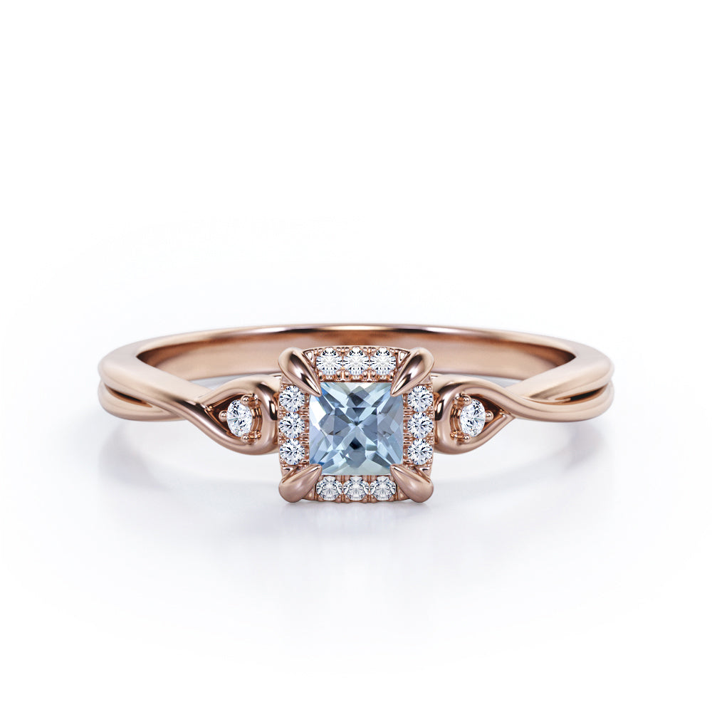 Prong and Halo 0.6 carat Princess Aquamarine and Moissanite Twisted Shank Engagement Ring in White Gold