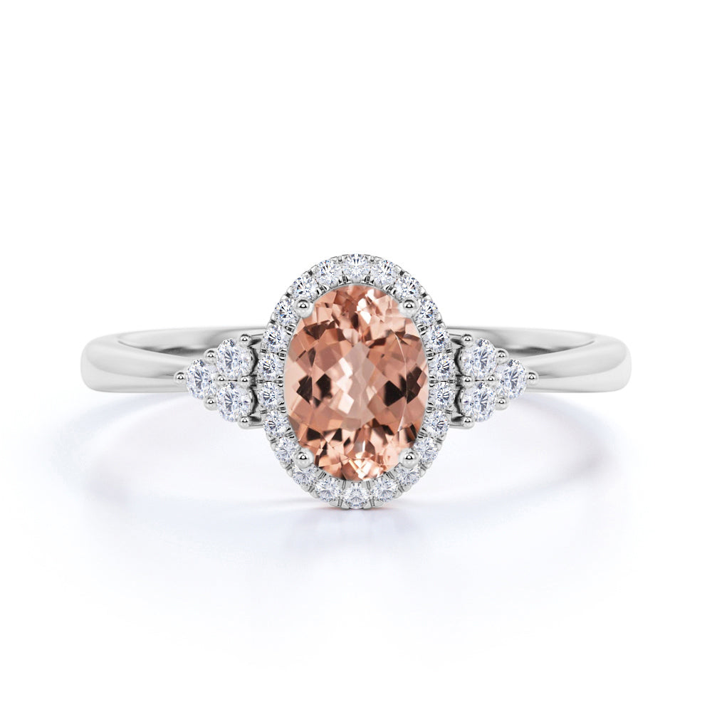 Four Prong 1.15 Carat Oval Cut Morganite and Six Stone Diamond Engagement Ring in Rose Gold