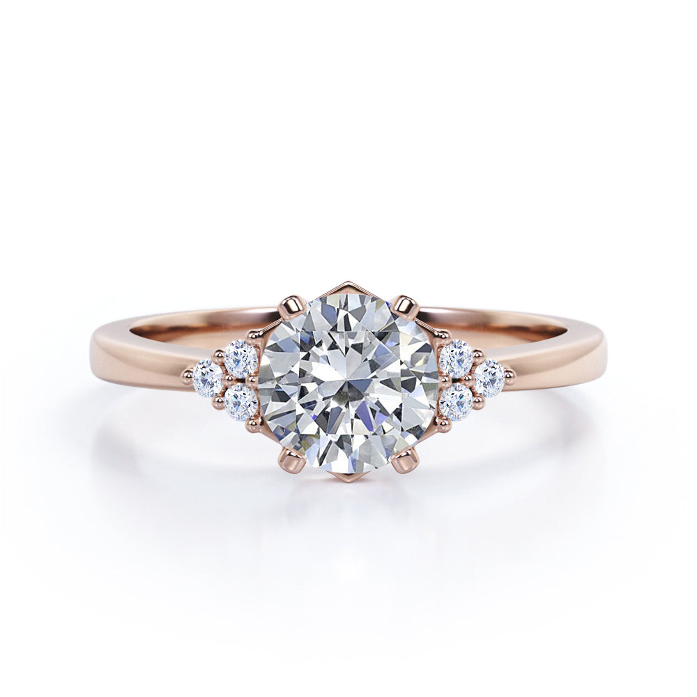 Tapered Classic 0.55 carat Round Moissanite and Diamond Engagement Ring in White Gold