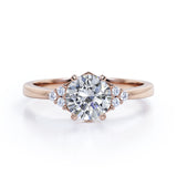 Tapered Classic 0.55 carat Round Moissanite and Diamond Engagement Ring in White Gold
