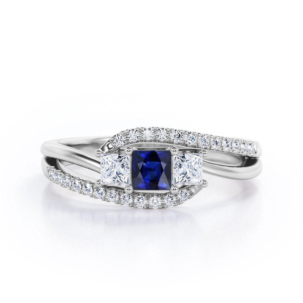 Shared Prongs 1 carat Princess Blue Sapphire and Moissanite Split Shank Band Engagement Ring in Rose Gold