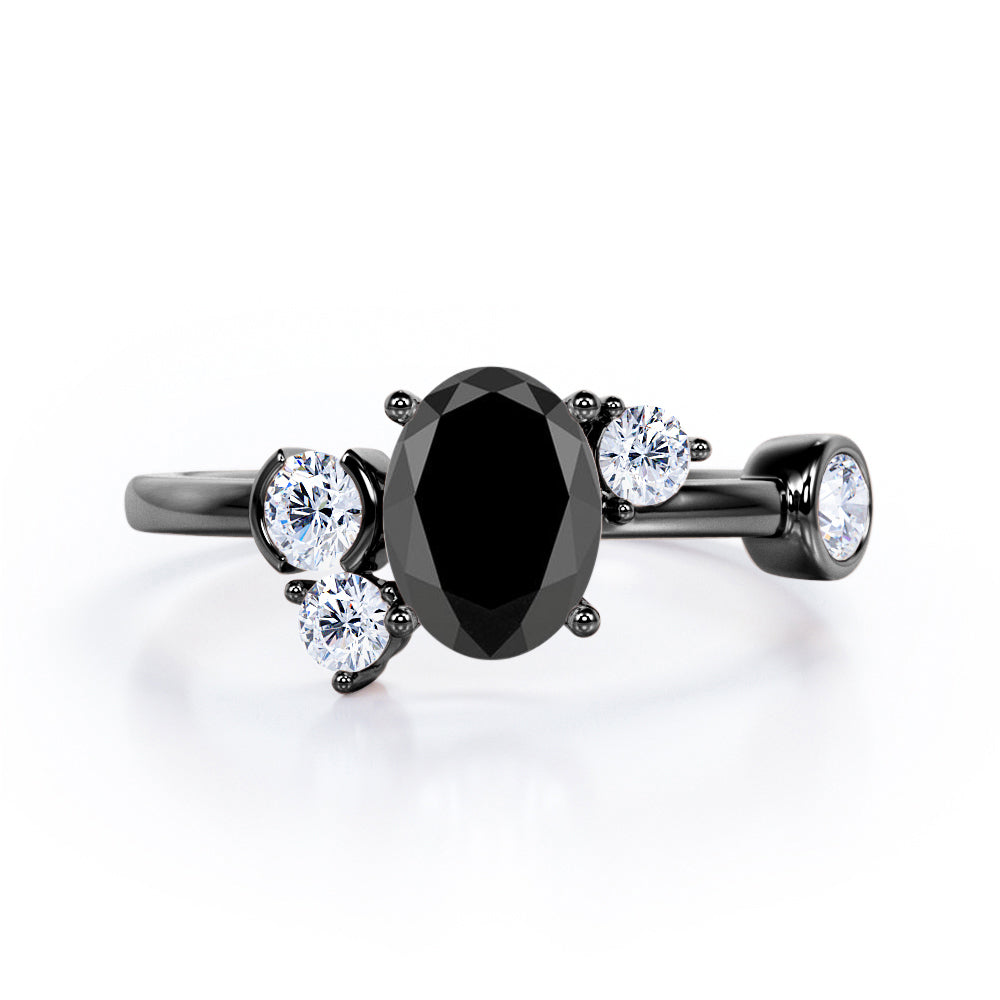 Unique 1 carat Oval Five Stone Ring With Petite Black Diamond in White Gold