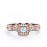 Double Pave Channel 1.5 Carat Round-Shaped Moonstone and diamond Halo Cluster Engagement Ring in Rose Gold