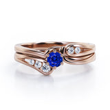 Mini Channel Design 0.5 TCW Round Cut Blue Sapphire and Moissanite Six-Prong Bridal Ring Set in White Gold