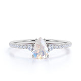 Surface Prong Set 1.50 Carat Pear White Blue Moonstone and Diamond Engagement Ring in Rose Gold