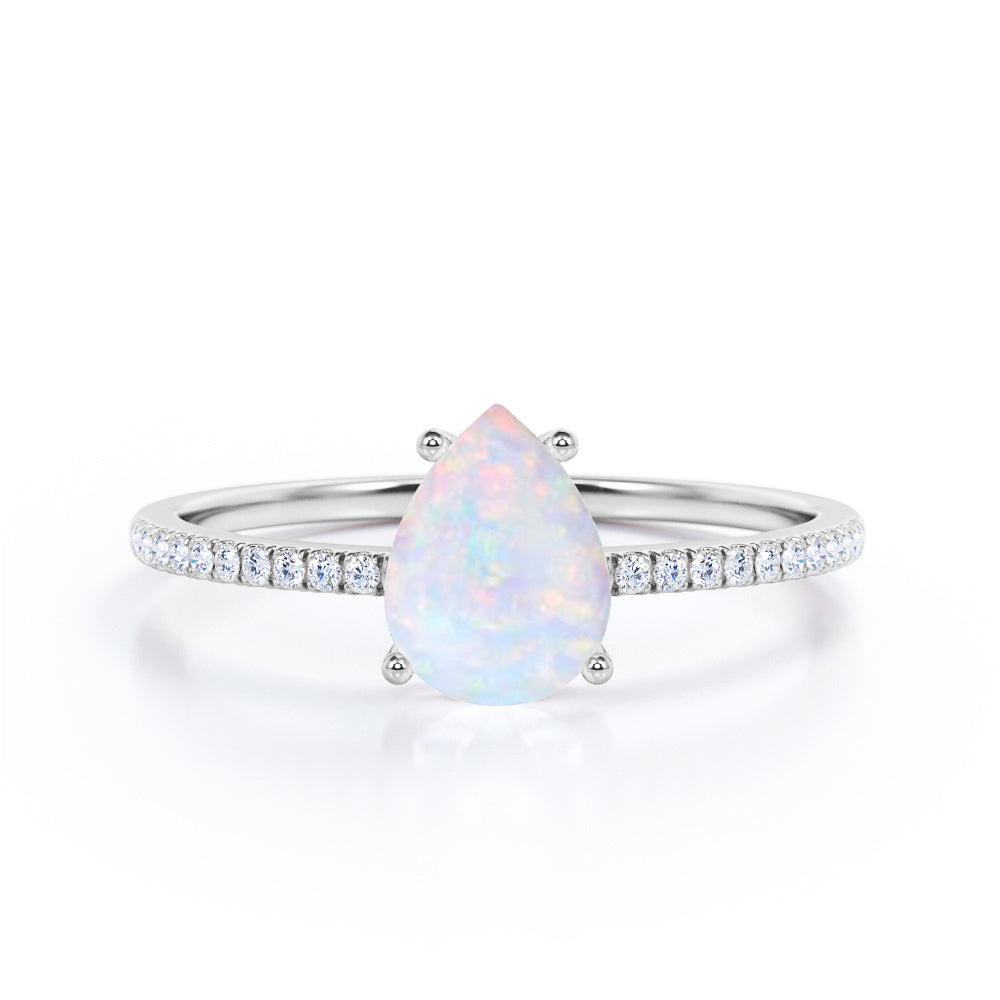 Pave Set 1.30 Carat Pear Cut Light Opal And Diamond Four Prong Basket Set Engagement Ring In Rose Gold