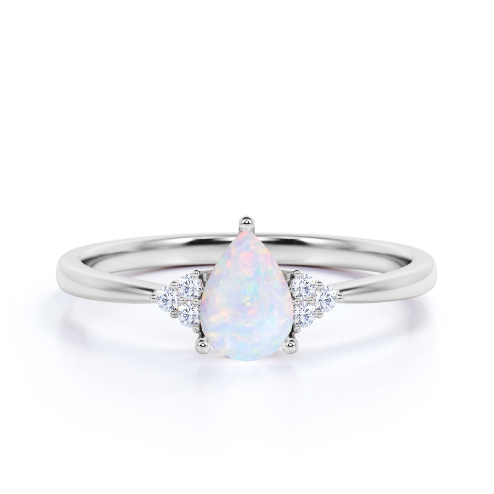 1.15 Ct Pear Cut Lab Created Opal Seven Stone Engagement Ring