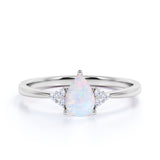 1.15 Ct Pear Cut Lab Created Opal Seven Stone Engagement Ring