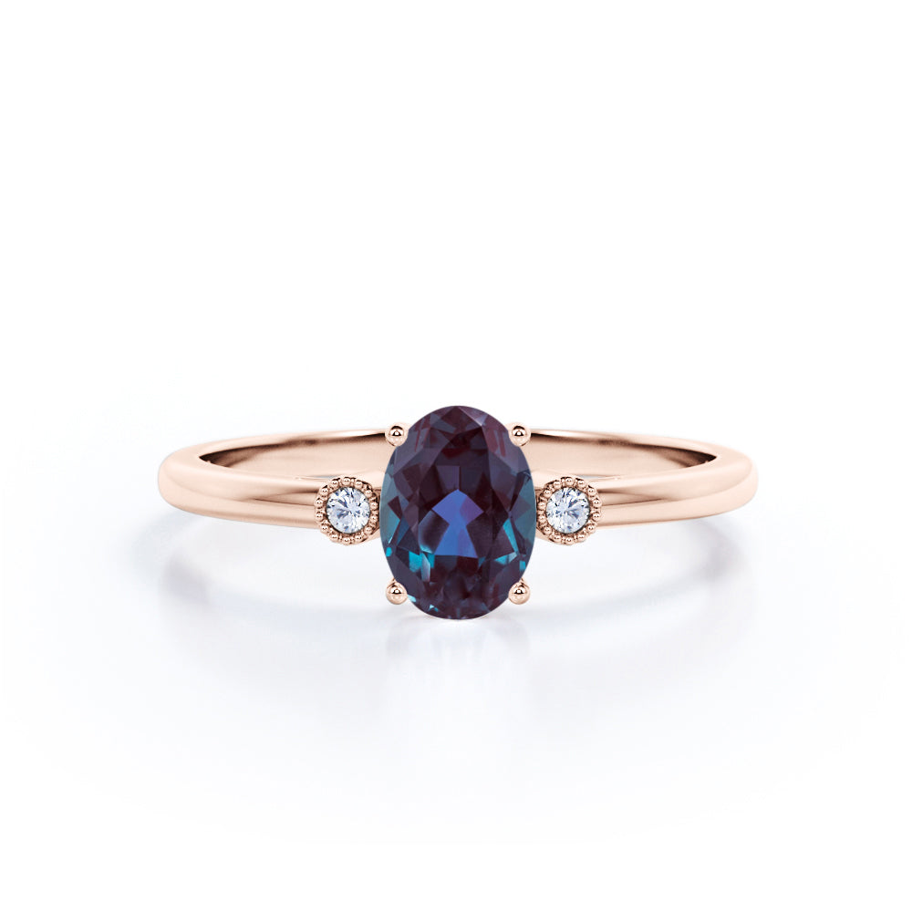 Unique Four Prong 1.10 Carat Oval Cut Lab Created Alexandrite And Diamond Three Stone Engagement Ring In White Gold