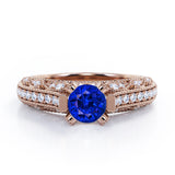 Beaded Four Prongs 1.40 Carat Round Cut Sapphire And Diamond Vintage Art Deco Engagement Ring In Rose Gold