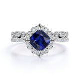 Unique Floral Styled 2 Carat Cushion Cut Sapphire and Diamond Halo Wedding Set with Art Deco Milgrain Band in White Gold