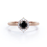 1 carat round cut Black Diamond halo engagement ring in white gold