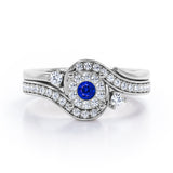 Pave-Prong Design 0.55 TCW Round Shape Blue Sapphire and Moissanite Bridal Ring Set in Rose Gold