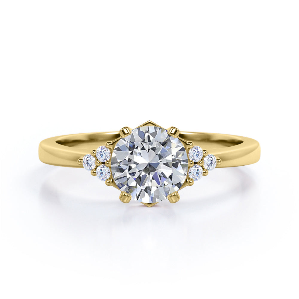Tapered Classic 0.55 carat Round Moissanite and Diamond Engagement Ring in White Gold