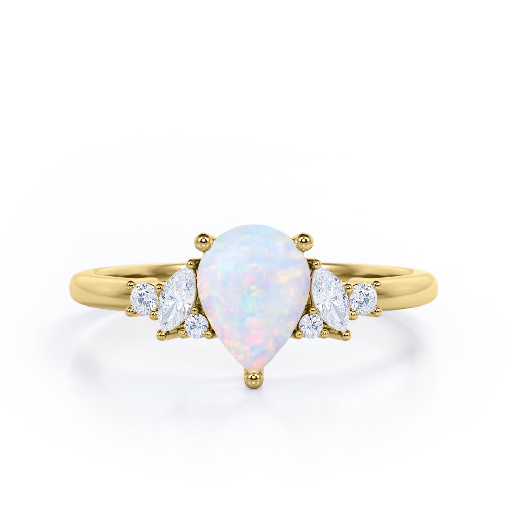 Seven Stone 0.6 Ct Pear Cut Lab Created Opal Engagement Ring