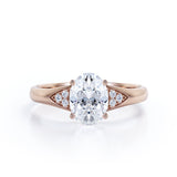 Tapered Shank 7 Stone 1.35 Carat Oval Cut Moissanite and Diamond Prong Basket Engagement Ring in White Gold