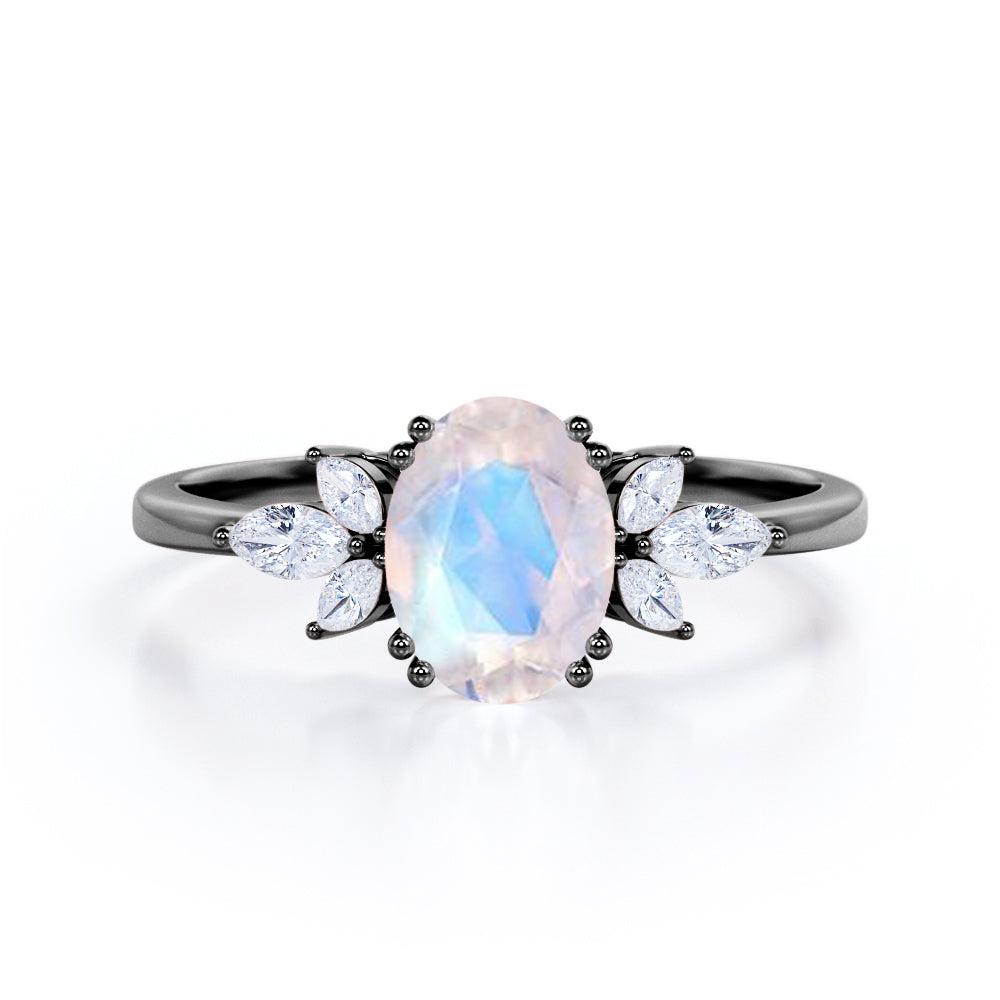 Seven Stone Nature-Inspired 1.10 carat Oval Moonstone and Moissanite Engagement Ring in Rose Gold