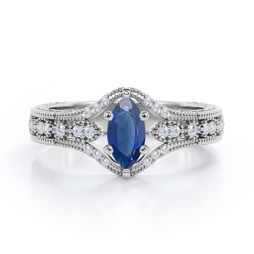 Beaded Framed 1.25 Carat Marquise Cut Sapphire And Diamond Vintage Filigree Engagement Ring In Rose Gold