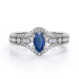 Beaded Framed 1.25 Carat Marquise Cut Sapphire And Diamond Vintage Filigree Engagement Ring In Rose Gold