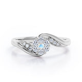 Floral Cloud Clustered 0.55 carat Round Moonstone and Moissanite Distorted Engagement Ring in White Gold
