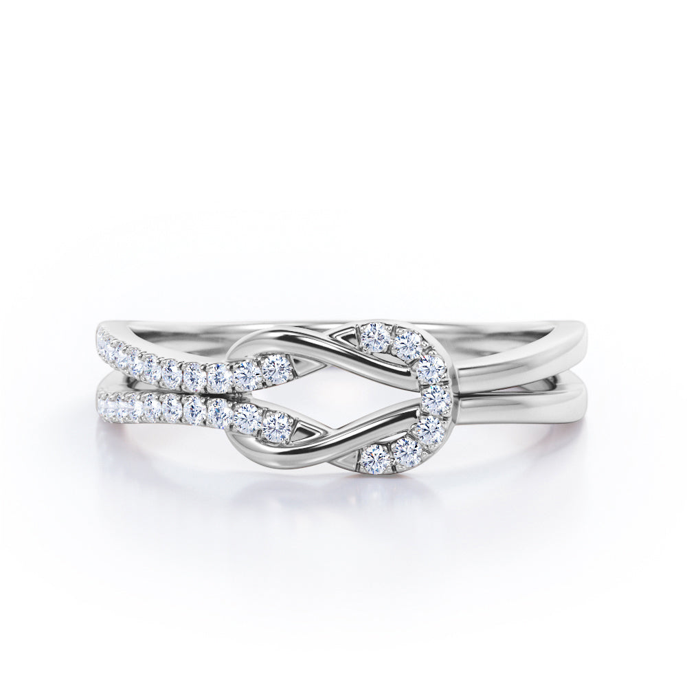 Reef Knot 0.25 carat Round Moissanite/Diamond Split Shank Ring in Roe Gold