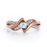 Distorted Unique Twisted Rope 0.6 carat Round Moonstone and Moissanites Promise Ring in Rose Gold