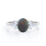 Butterfly style 1.25 Carat Oval Cut Natural Black Fiery Opal And Diamond Nature Inspired Engagement Ring In White Gold