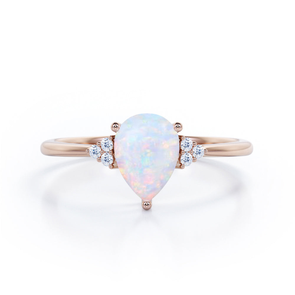 1.05 Ct Pear Cut Lab Created Opal Seven Stone Engagement Ring