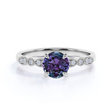 Four Claw 1.25 Carat Round Cut Lab Grown Alexandrite and Diamond Art Deco Solitaire Engagement Ring